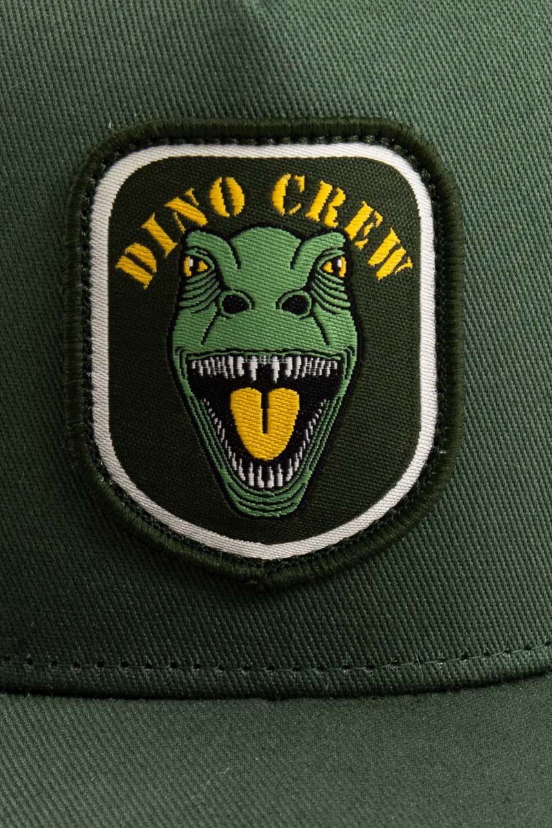 Fin grøn kasket til børn med print af dinosaur