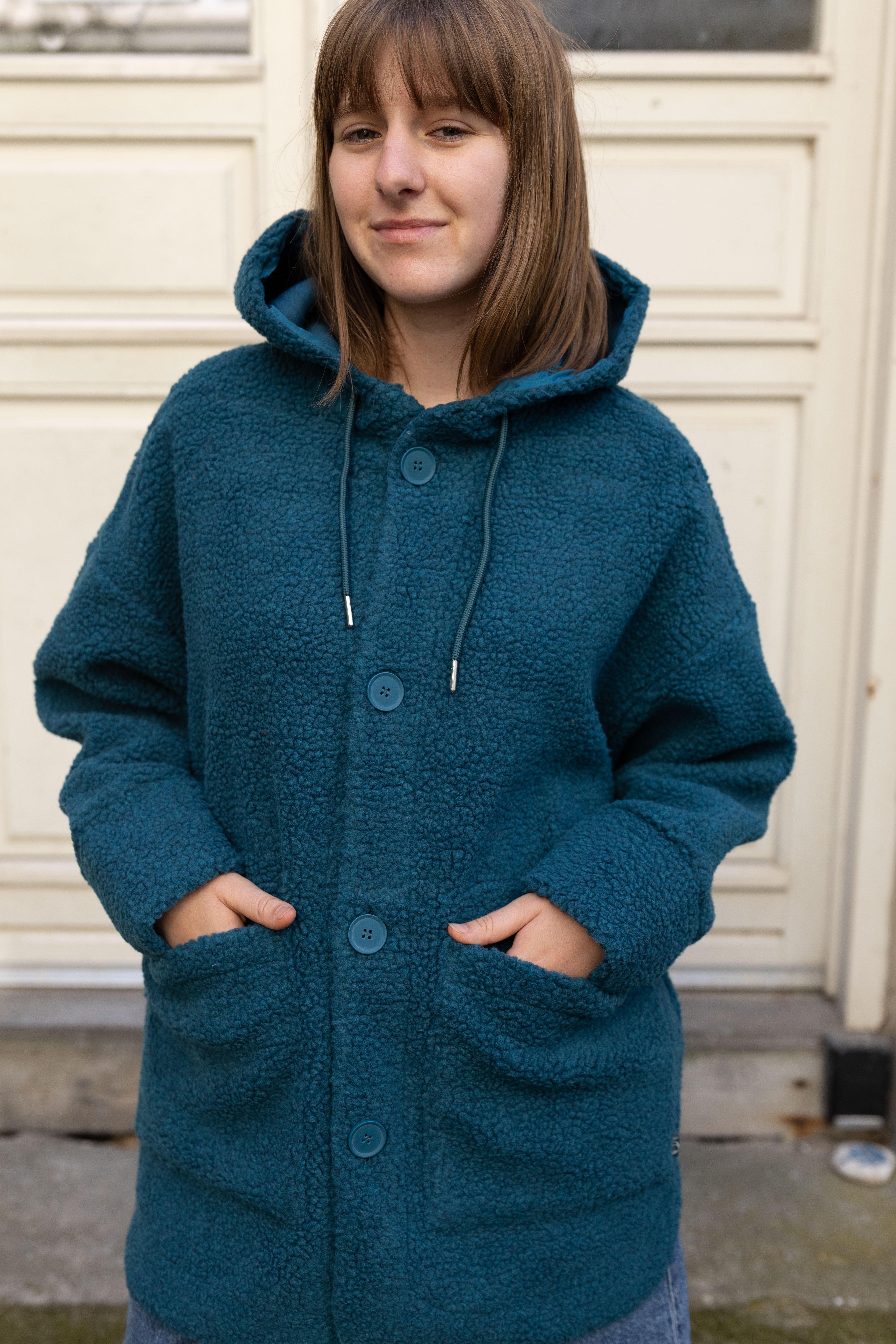 Lækker fuzzy fleecejakke i blågrøn nuance til kvinder