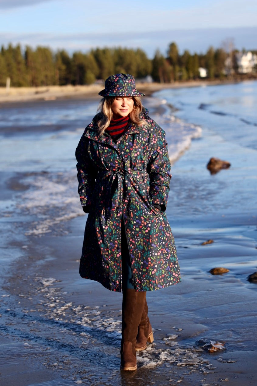 Vandtæt regnfrakke med blomstret mønster til kvinder