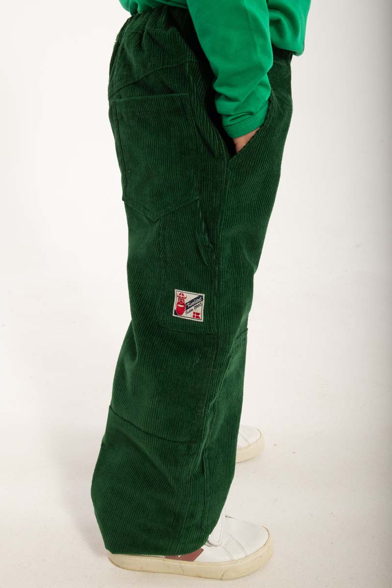 Oversized fløjlsbukser til børn i mørkegrøn