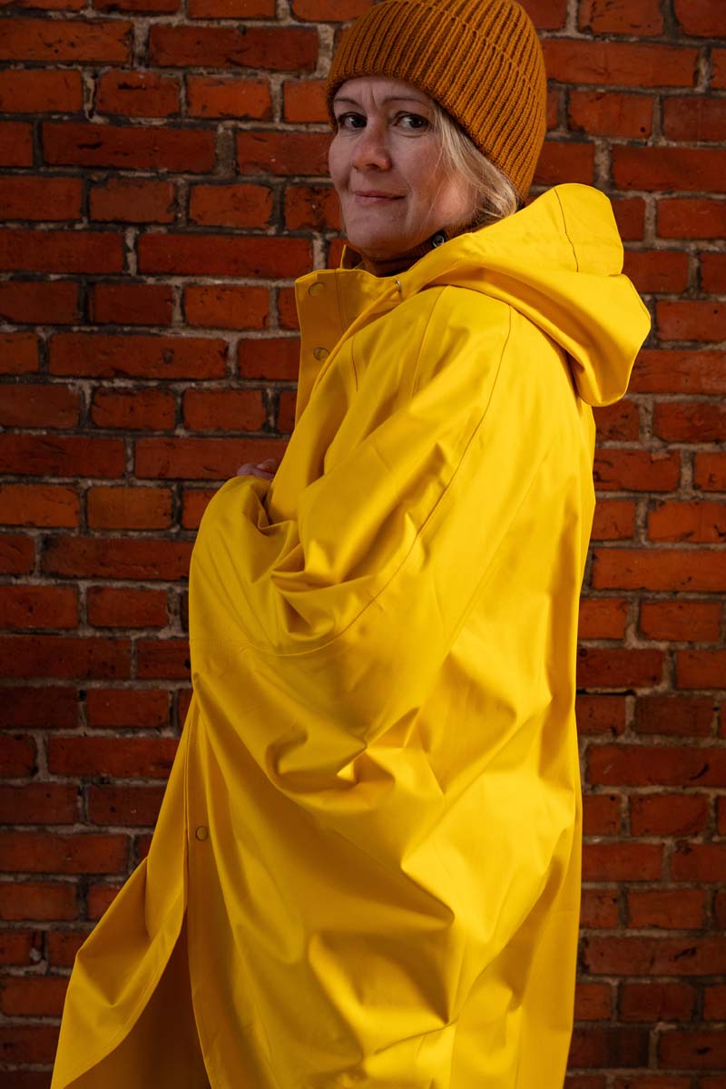 Regn poncho i gul. Regnslag fra Danefæ