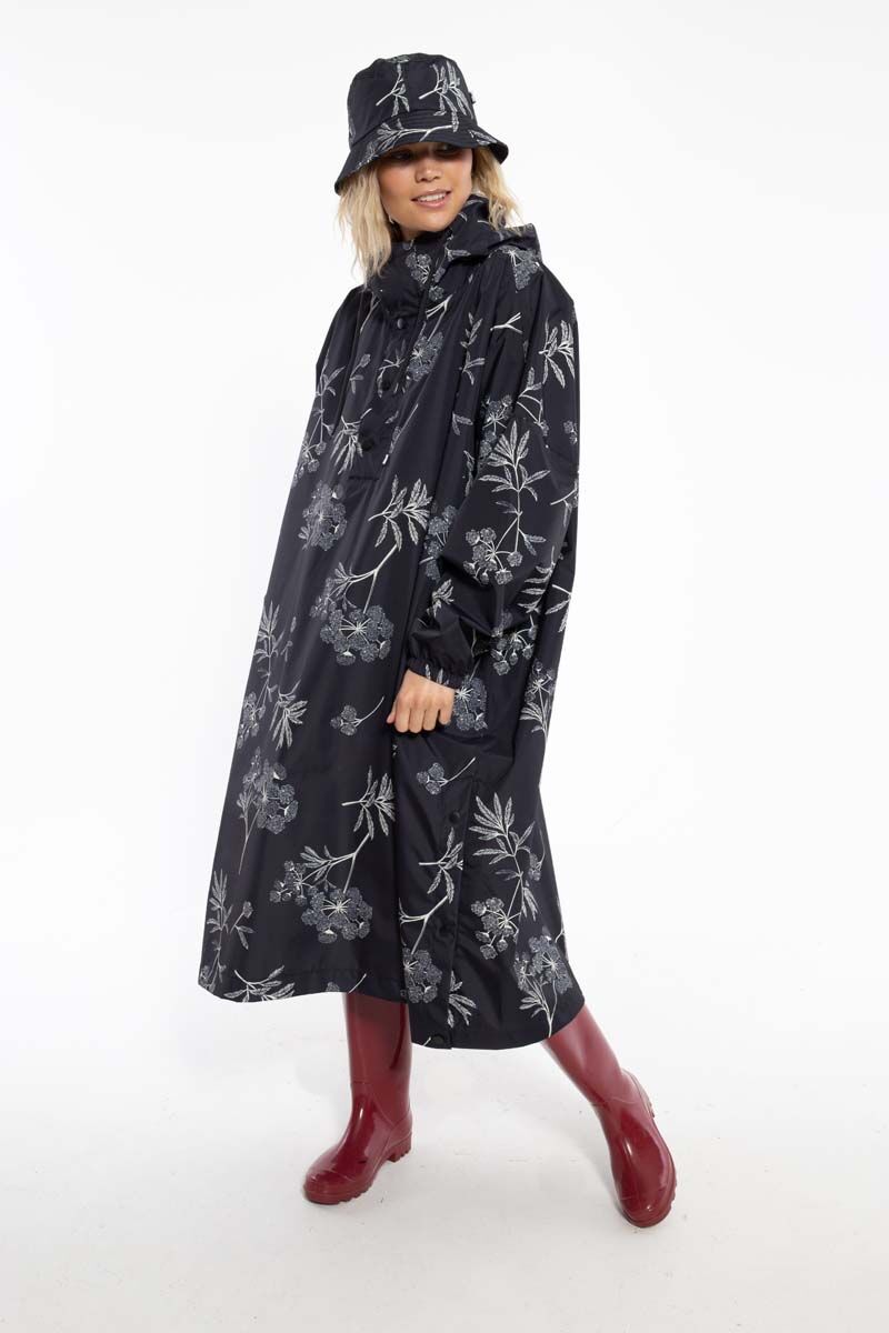 Regnslag til dame. Danefæ regnponcho.