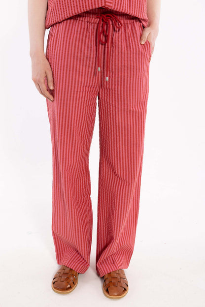 Lækre bæk og bølge bukser med elastik i taljen og røde og lyserøde striber til kvinder
