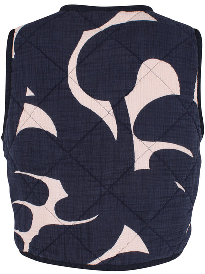 Smuk quiltet vest i navyblåt og hvidt mønster til kvinder