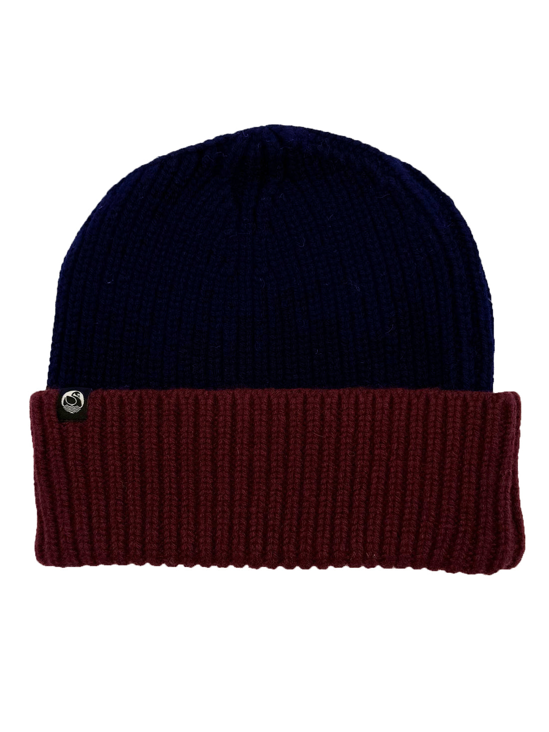 Fin navyblå og bordeauxrød hue i 100% merinould